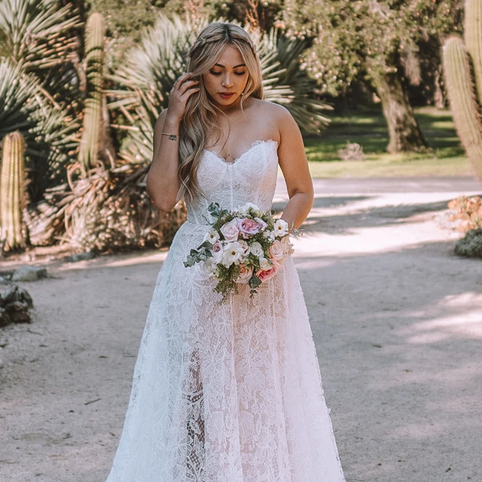 All Who Wander Bridal Gowns About Us